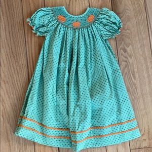 Smocked pumpkin dress